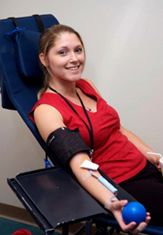 Girl giving blood